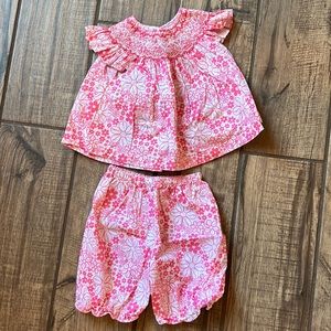 Darling smocked pink and white outfit with florals.